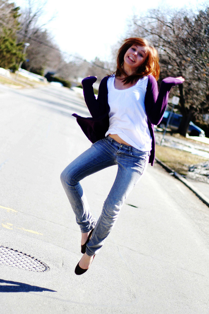 Slim-fit dark wash denim jeans, side view